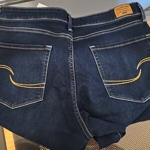 Signature by Levi Strauss Woman Dark Blue Jeans with Yellow Stitching.
